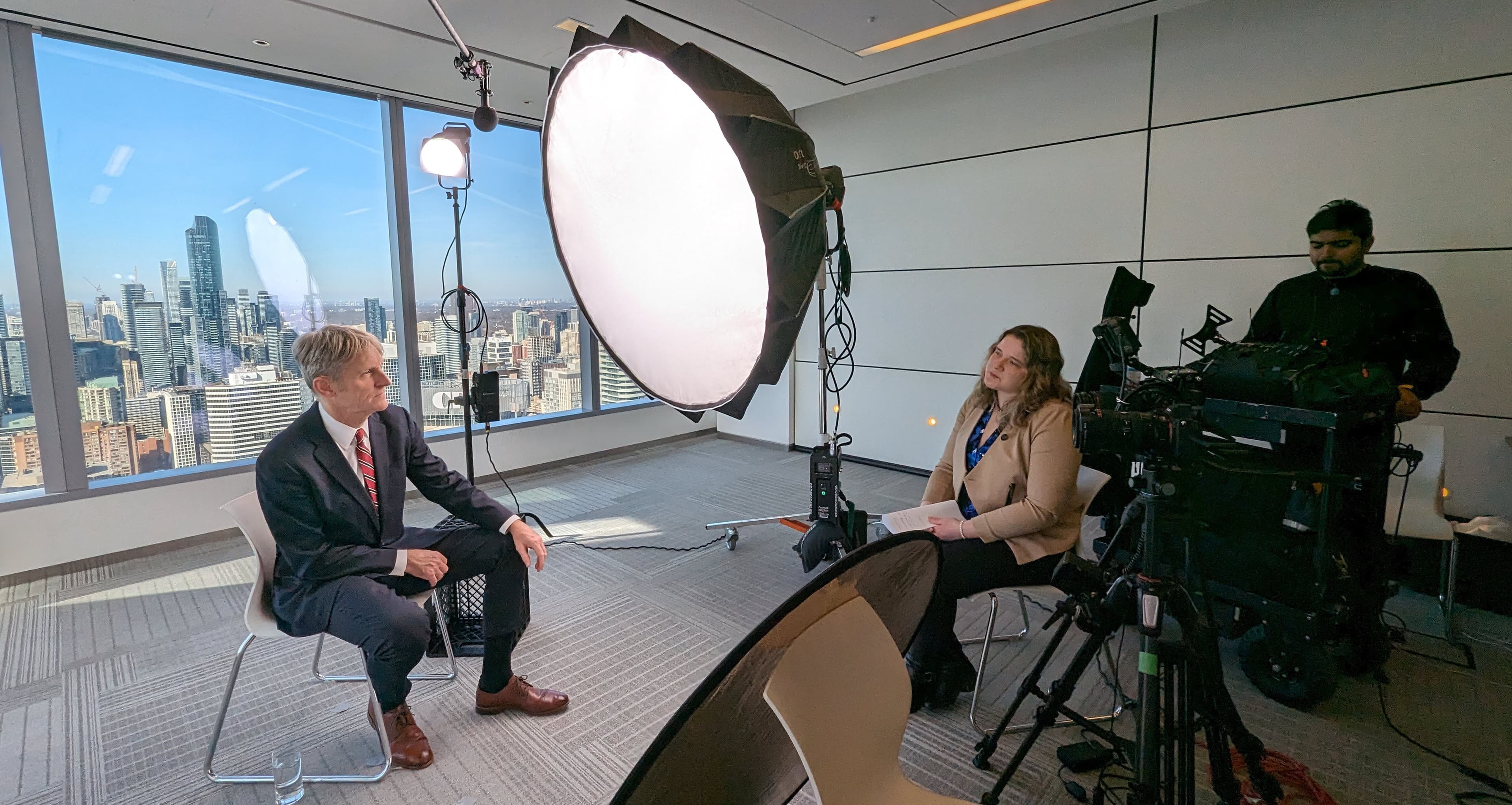 Michael McCrae behind a spotlight